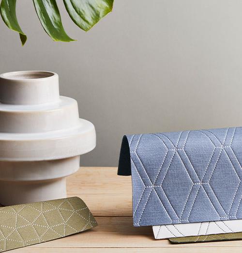 Etched vinyl patterns that balance refined detailing with practical performance.